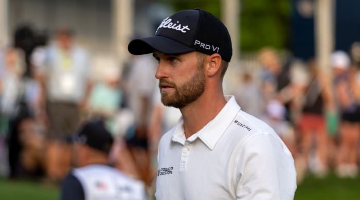 Wyndham Clark walks from the 18th green during the third round of THE PLAYERS Championship golf tournament.